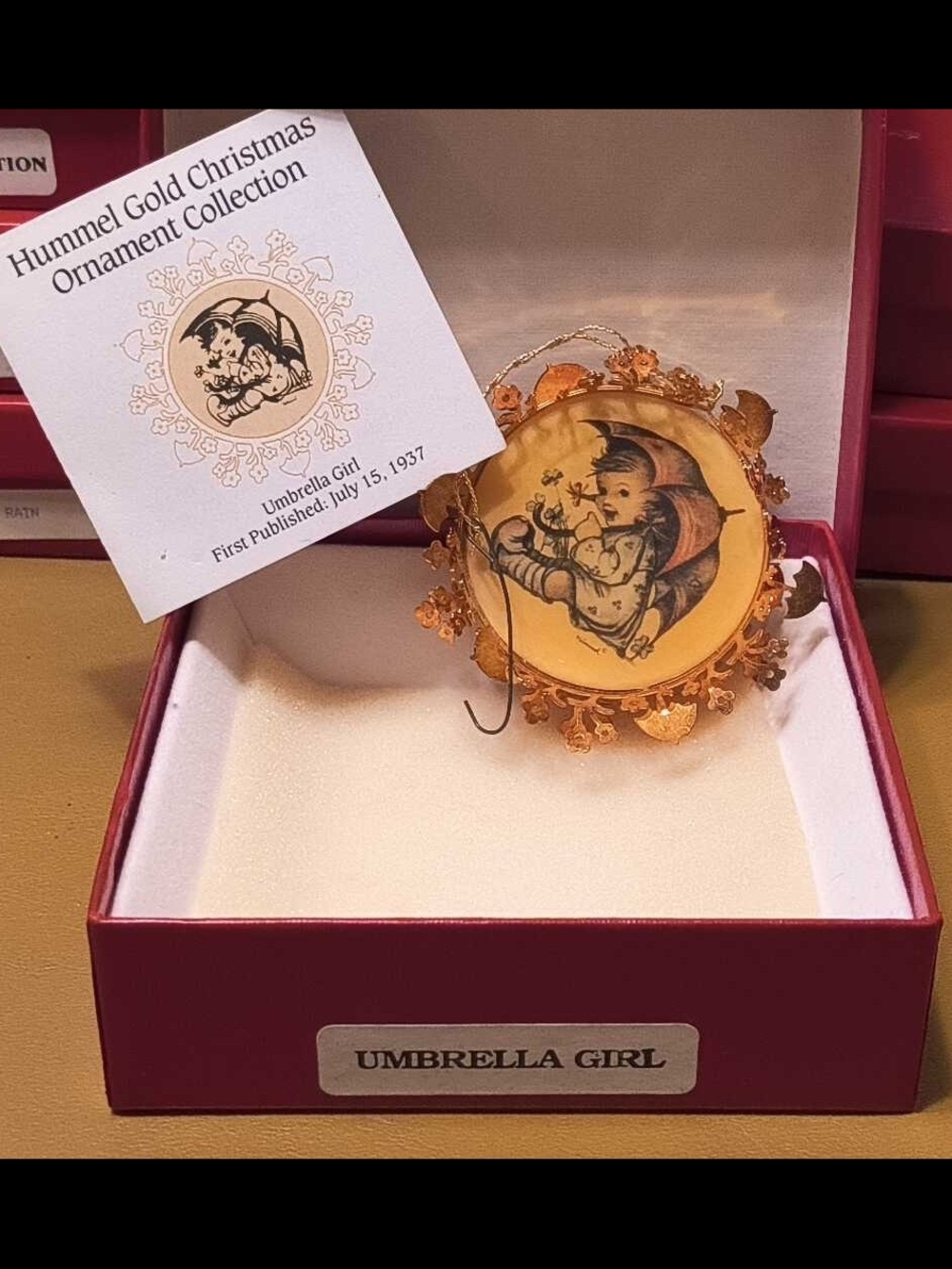 PRISTINE 1988 Hummel Gold Ornament "Umbrella Girl" - NIB w/ Booklet